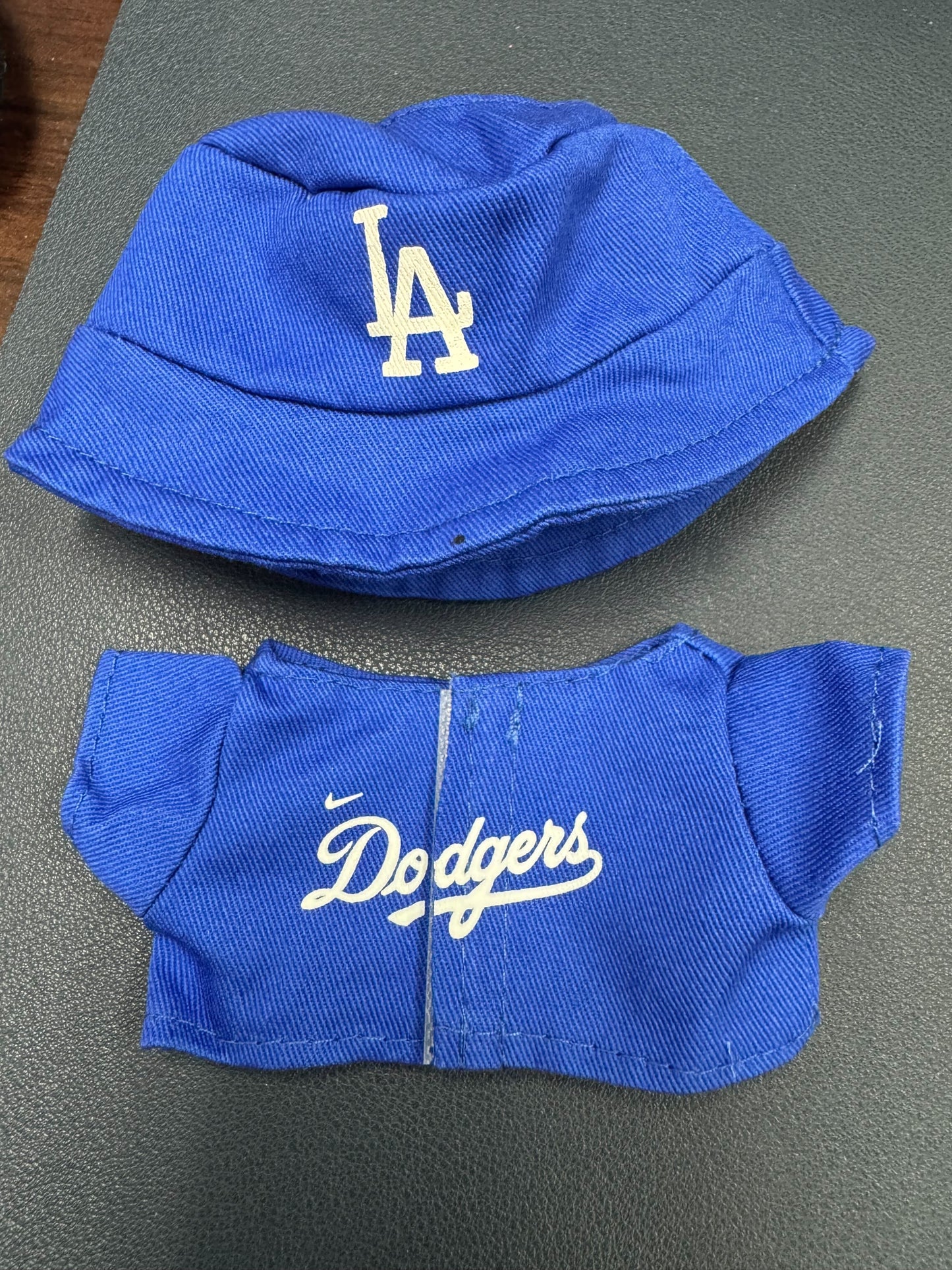 Dodgers Labubu doll set with uniform, hat, and player-inspired accessories including Ohtani, Freeman, and Betts
