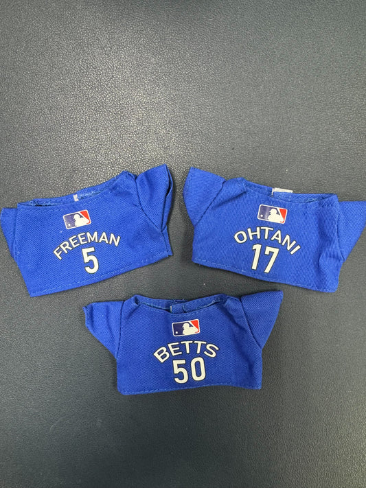 Labubu Dodgers collection featuring blue crew uniform, cap, and mini accessories inspired by top players