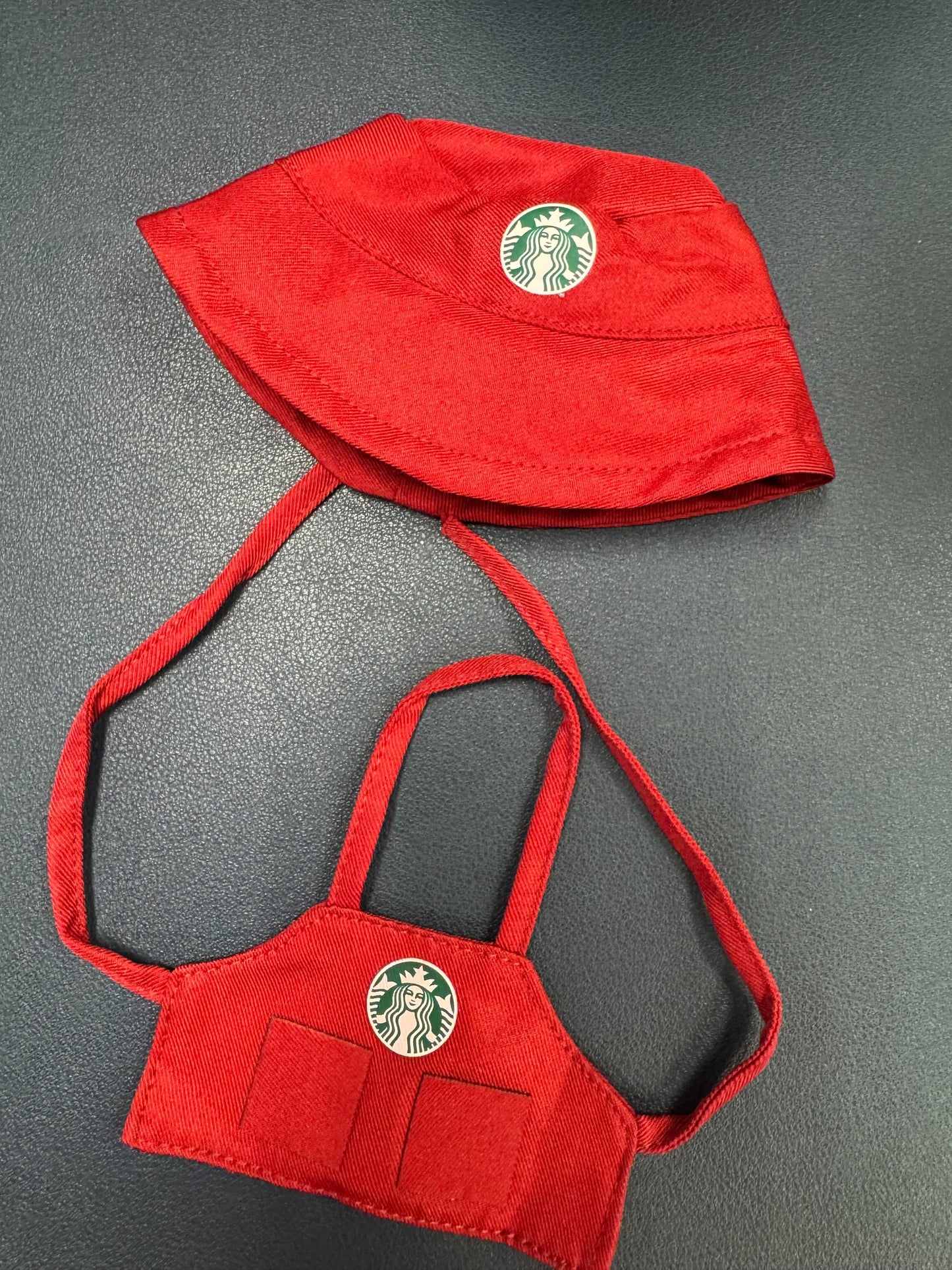 Christmas red labubu barista uniform set with hat and apron featuring Starbucks logo for adorable Labubu dolls.