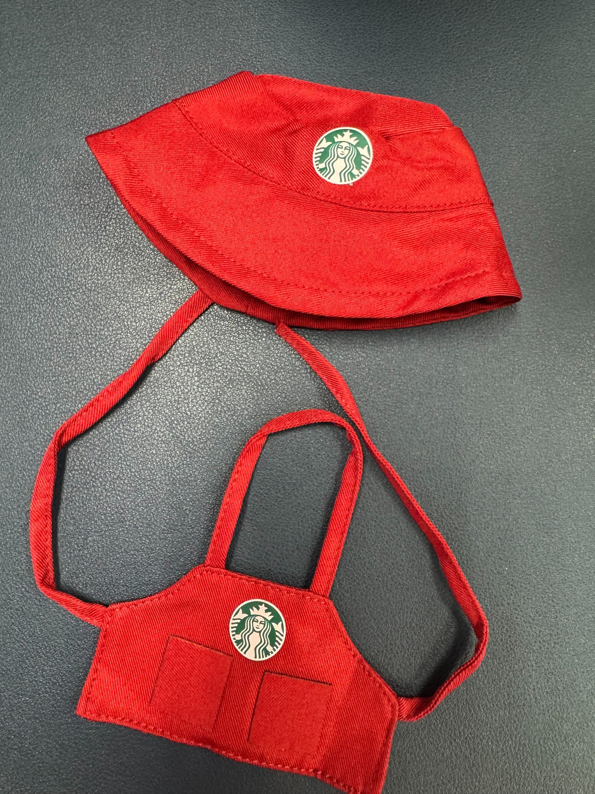 Christmas red labubu barista uniform set with hat and apron featuring Starbucks logo for adorable Labubu dolls.