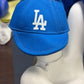 Dodgers-themed Labubu dolls with blue crew caps, uniforms, and baseball player-inspired accessories
