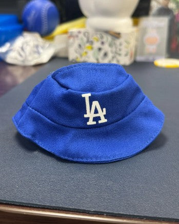 Dodgers-themed Labubu dolls with blue crew caps, uniforms, and baseball player-inspired accessories