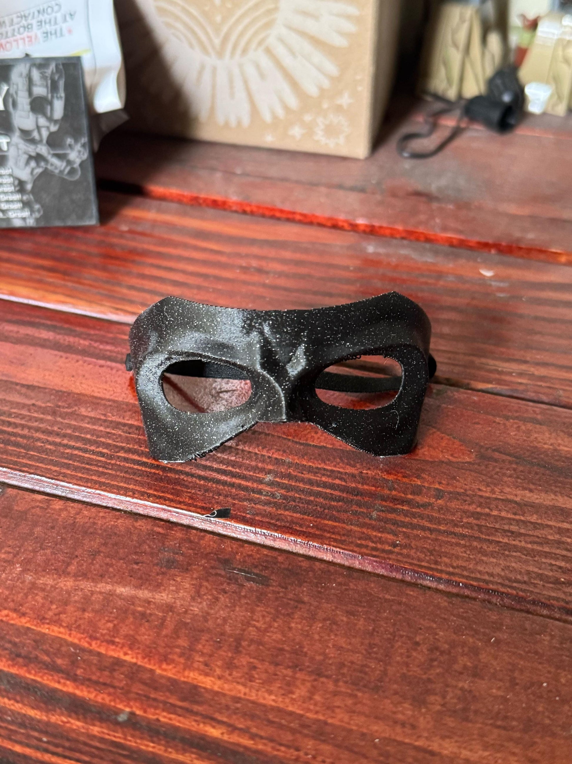 Black glitter Labubu superhero mask for doll cosplay, perfect accessory for tiny heroes and Labubu collectors.