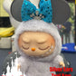 Cinderella-themed Labubu collectible doll with silver mouse ears and teal sparkly bow, perfect for fans and kawaii collectors.
