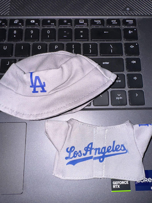 Dodgers Labubu away jersey and bucket hat set in grey with blue 'Los Angeles' logo, perfect for Labubu doll fans.